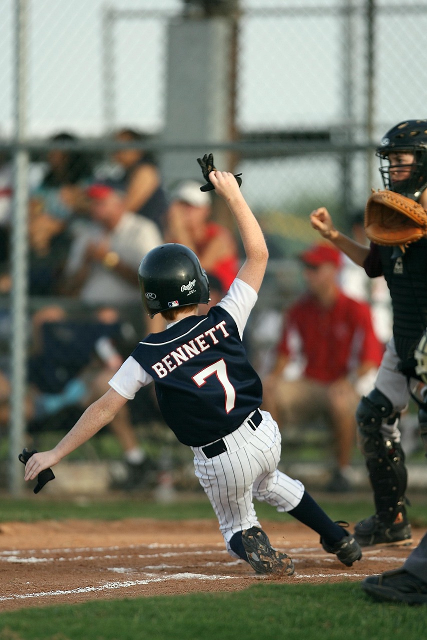 baseball, scoring, sliding, runner, player, youth, kid, boy, sport, game, score, home, action, little league, catcher, spectators, helmet, nature, home plate, base path, dirt, grass
